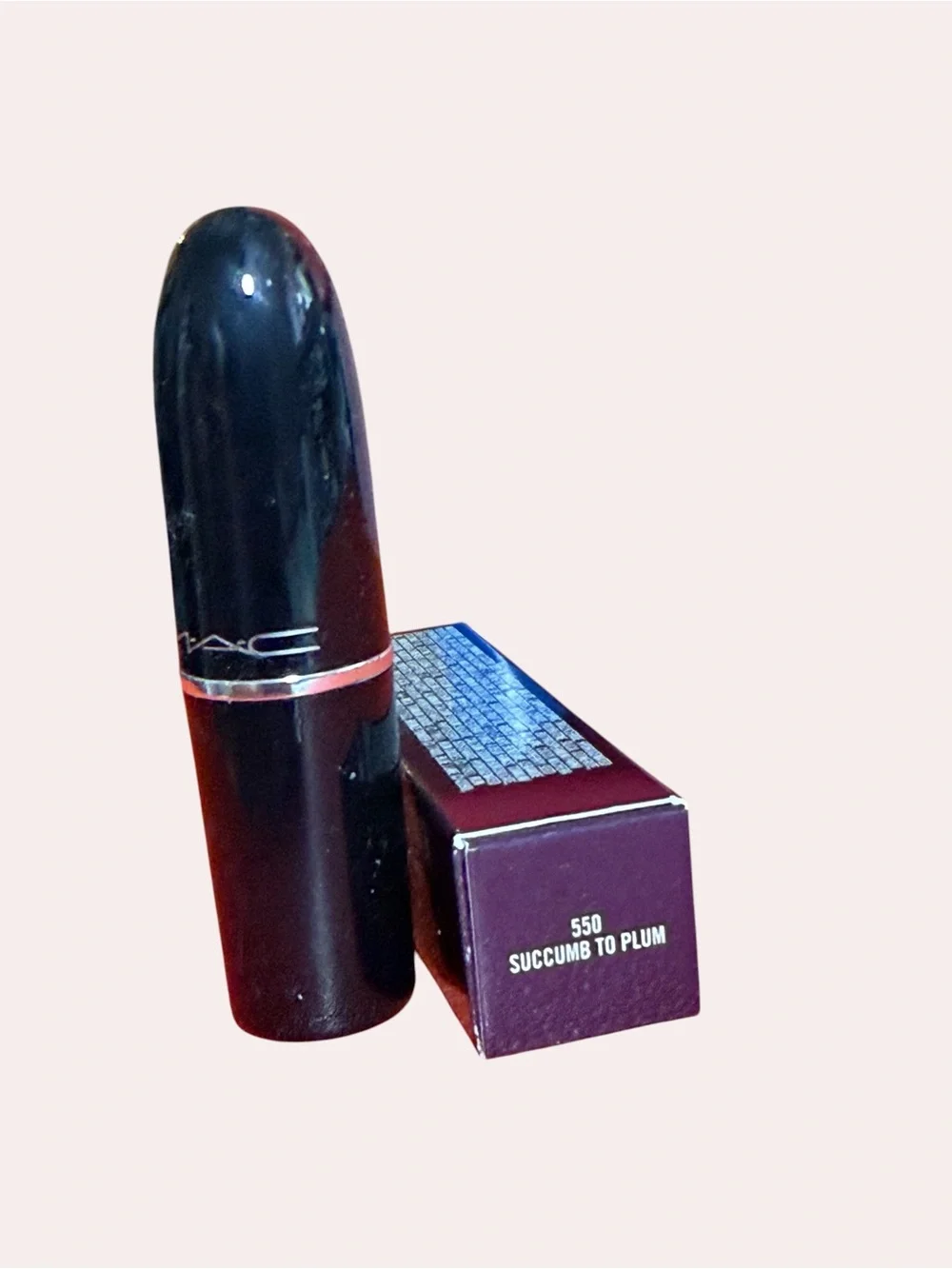 MAC Lustreglass Lipstick in shade, SUCCUMB TO PLUM Deep Plum